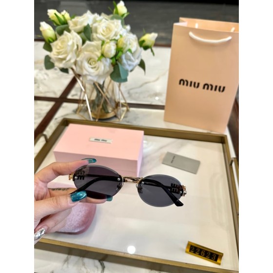 Miu Miu Rimless Oval Sunglasses with Logo Details